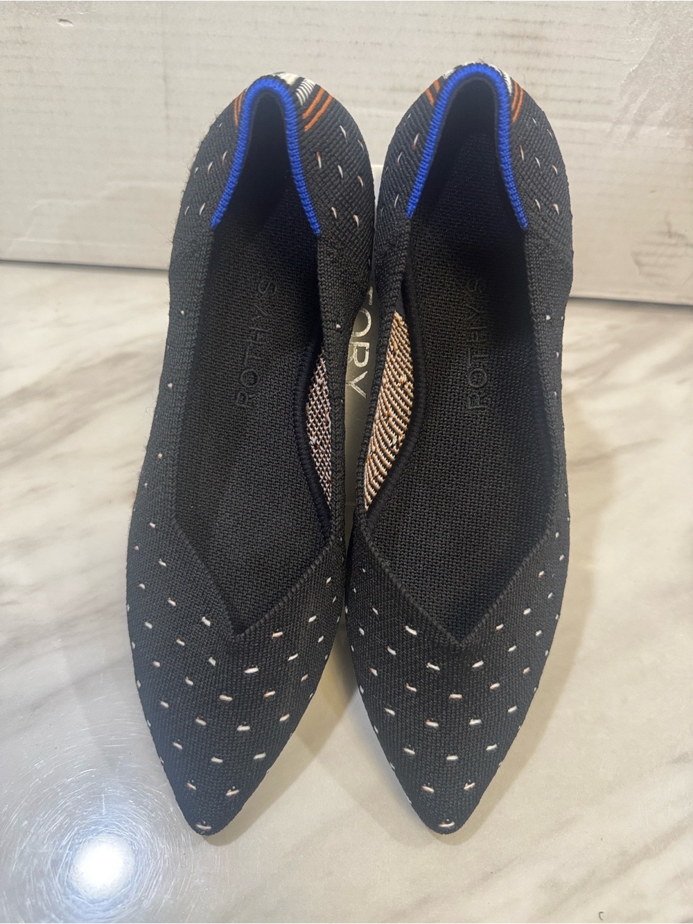Rothy's Black Pointed Knit Flats with Blue Heel Accent